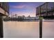 The tranquil waterway and waterfront homes are framed by a wooden boardwalk at 4789 Arco Ln, North Charleston, SC 29418