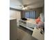 Inviting bedroom with a ceiling fan, closet, and a bed with patterned bedding, creates a cozy atmosphere at 4957 Trump St, North Charleston, SC 29420