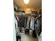 Walk-in closet with ample storage including shelving, hanging rods, and storage boxes, offering organized space at 4957 Trump St, North Charleston, SC 29420