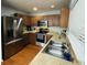 Well-equipped kitchen featuring stainless steel appliances and ample storage space at 4957 Trump St, North Charleston, SC 29420