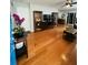 Inviting living room boasting gleaming hardwood floors and stylish decor at 4957 Trump St, North Charleston, SC 29420