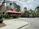 Community pavilion featuring picnic tables, a playground, and climbing equipment for outdoor enjoyment at 4957 Trump St, North Charleston, SC 29420