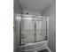 Bathroom shower featuring sliding glass doors and chrome fixtures at 4957 Trump St, North Charleston, SC 29420