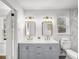 Bright bathroom featuring double sinks, and a marble-tiled shower in a modern, clean design at 5330 Waterview Dr, North Charleston, SC 29418