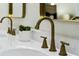 Bathroom showcasing a gold faucet, with focus on the marble countertop and modern fixtures at 5330 Waterview Dr, North Charleston, SC 29418