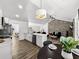 Bright kitchen showcasing white cabinetry, stainless steel appliances, and stylish modern finishes at 5330 Waterview Dr, North Charleston, SC 29418