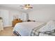 Bedroom featuring a bed frame with white and earth-tone colors, and various pieces of furniture at 5409 Clairmont Ln, North Charleston, SC 29420