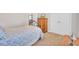 Cozy bedroom with comfortable bed, dresser, and easy access to closet and en-suite bathroom at 5409 Clairmont Ln, North Charleston, SC 29420