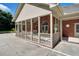 Charming clubhouse porch with ceiling fans, flower boxes, and a beautiful view at 5409 Clairmont Ln, North Charleston, SC 29420