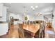 Open-concept living space with kitchen, dining, and living areas, perfect for entertaining at 5409 Clairmont Ln, North Charleston, SC 29420