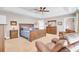 Large bedroom featuring neutral walls, a tray ceiling, carpet and large windows for natural light at 5409 Clairmont Ln, North Charleston, SC 29420