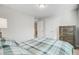Cozy bedroom with a closet, dresser, and a comfortable bed at 5415 Clairmont Ln, North Charleston, SC 29420