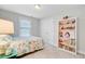 Cozy bedroom with a window and decorative bookcase at 5415 Clairmont Ln, North Charleston, SC 29420