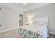 Comfortable bedroom with a brightly colored quilt at 5415 Clairmont Ln, North Charleston, SC 29420