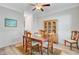 Traditional dining room with hardwood floors and classic furniture at 5415 Clairmont Ln, North Charleston, SC 29420