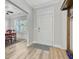 Bright foyer featuring hardwood floors, neutral walls, and ample natural light at 5415 Clairmont Ln, North Charleston, SC 29420