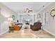 Bright living room featuring hardwood floors, neutral walls, and plenty of natural light at 5415 Clairmont Ln, North Charleston, SC 29420