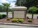 Community entrance sign for Cedar Grove with flowers and landscaping at 5415 Clairmont Ln, North Charleston, SC 29420