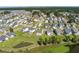 Residential neighborhood with well-manicured lawns, serene ponds, and tree-lined streets, offering a peaceful suburban lifestyle at 543 Pendleton Dr, Moncks Corner, SC 29461