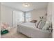 Bright bedroom with a comfortable bed, closet, and a cozy sitting area for relaxation at 543 Pendleton Dr, Moncks Corner, SC 29461