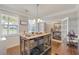 Dining room featuring a wooden island, natural light, and elegant decor at 543 Pendleton Dr, Moncks Corner, SC 29461