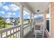 Charming front porch with white columns, offering a relaxing space to enjoy neighborhood views at 543 Pendleton Dr, Moncks Corner, SC 29461