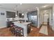 Modern kitchen with a central island, stainless steel appliances, and a breakfast bar at 543 Pendleton Dr, Moncks Corner, SC 29461