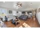 Spacious living room featuring vaulted ceilings, hardwood floors, and open concept design with kitchen and dining area at 543 Pendleton Dr, Moncks Corner, SC 29461