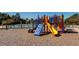 Community playground featuring slides and climbing equipment next to a swimming pool and picnic area at 543 Pendleton Dr, Moncks Corner, SC 29461