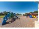 Community playground with colorful slides, climbing structures, and a wood chip ground cover at 543 Pendleton Dr, Moncks Corner, SC 29461