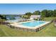 Community pool with a large deck and lounge chairs overlooking the waterway and offering beautiful views at 543 Pendleton Dr, Moncks Corner, SC 29461