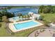 Aerial view highlights a community pool area, clubhouse, lake, and well-maintained landscaping at 543 Pendleton Dr, Moncks Corner, SC 29461
