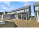 Lovely blue home with a screened in porch, small backyard, and fence for added privacy at 565 Blueway Ave, Summerville, SC 29486