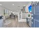 Bright entryway with hardwood floors, a staircase, and an open view of the living spaces at 565 Blueway Ave, Summerville, SC 29486