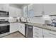 Clean kitchen with stainless steel appliances, granite countertops, and classic subway tile backsplash at 565 Blueway Ave, Summerville, SC 29486