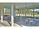 Outdoor seating area with tables and chairs, providing a comfortable and communal space for residents at 565 Blueway Ave, Summerville, SC 29486