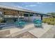 Outdoor seating area with colorful tables and chairs at 565 Blueway Ave, Summerville, SC 29486