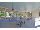 Covered outdoor dining area with multiple tables and chairs, perfect for community gatherings and events at 565 Blueway Ave, Summerville, SC 29486