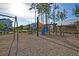 Well-equipped community playground featuring slides, climbing structures, and a shaded area for enjoyment at 565 Blueway Ave, Summerville, SC 29486
