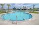 Beautiful pool with palm trees and comfortable seating areas at 565 Blueway Ave, Summerville, SC 29486