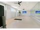 Bright yoga studio with mirrors, ceiling fans, and serene ambiance at 565 Blueway Ave, Summerville, SC 29486