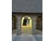 A unique brick archway leads to an exterior staircase and courtyard with benches at 6601 Dorchester Rd # 109, North Charleston, SC 29418