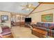 Spacious living room boasts comfortable seating and views into the adjacent hallway at 729 2Nd Bend Rd, Harleyville, SC 29448