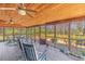 Comfortable covered patio with ample seating for outdoor relaxation at 729 2Nd Bend Rd, Harleyville, SC 29448