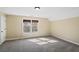 Sunlit bedroom features plush carpet and neutral paint at 743 Kent St, Mount Pleasant, SC 29464