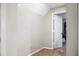 Bedroom featuring neutral walls, carpet, and doorway to the side at 8458 William Moultrie Dr, North Charleston, SC 29420