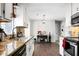 Well-equipped kitchen featuring granite countertops, modern appliances, and ample cabinet space at 8458 William Moultrie Dr, North Charleston, SC 29420