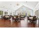 Bright event space featuring tall vaulted ceilings, large windows, and beautiful chandeliers at 9021 Delancey Cir, North Charleston, SC 29406