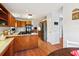 Traditional kitchen with wood cabinets, granite countertops and stainless steel appliances at 9021 Delancey Cir, North Charleston, SC 29406