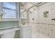 Bright bathroom featuring tiled shower, updated vanity, and modern fixtures at 958 Mikell Dr, Charleston, SC 29412